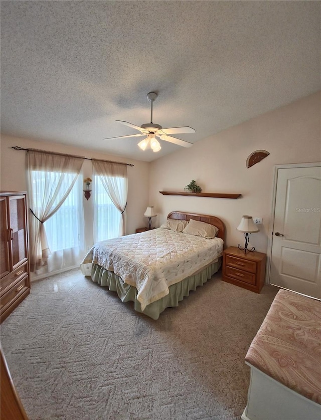 2909 Pine Tree Dr, Edgewater, FL 32141 - carpeted bedroom with a textured ceiling and ceiling fan