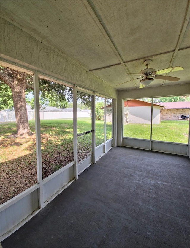 2909 Pine Tree Dr, Edgewater, FL 32141 - unfurnished sunroom with a ceiling fan