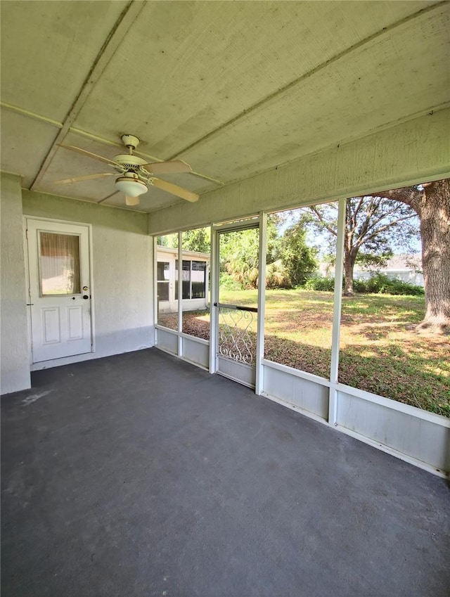 2909 Pine Tree Dr, Edgewater, FL 32141 - unfurnished sunroom with healthy amount of natural light and ceiling fan