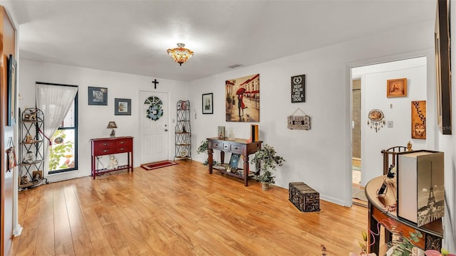 527 Duchess Dr, Lakeland, FL 33803 - entrance foyer with light wood-style flooring and baseboards