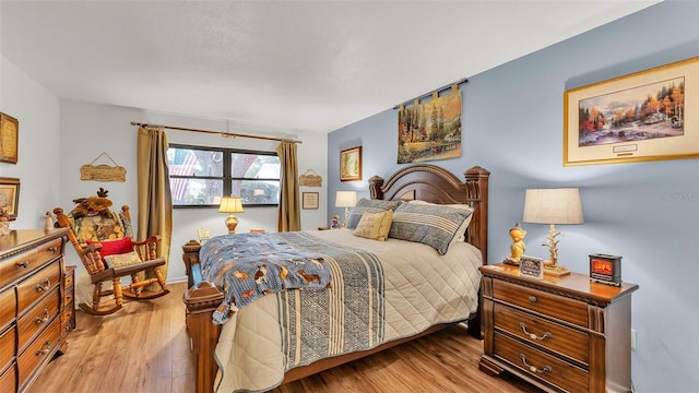 527 Duchess Dr, Lakeland, FL 33803 - bedroom featuring wood finished floors