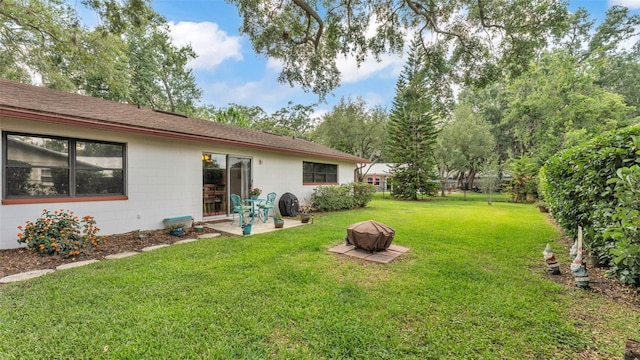 527 Duchess Dr, Lakeland, FL 33803 - view of grassy yard with a patio