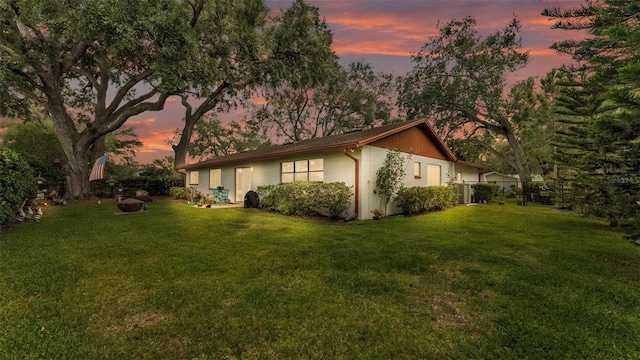 527 Duchess Dr, Lakeland, FL 33803 - view of property exterior featuring a lawn