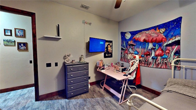 540 Phillips Rd, Sebring, FL 33875 - home office featuring wood finished floors, baseboards, and a ceiling fan
