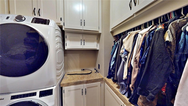 540 Phillips Rd, Sebring, FL 33875 - laundry area with cabinet space and estacked washer and dryer