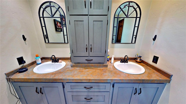 540 Phillips Rd, Sebring, FL 33875 - bathroom with a textured wall and double vanity