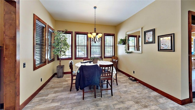 540 Phillips Rd, Sebring, FL 33875 - dining room featuring a chandelier and baseboards