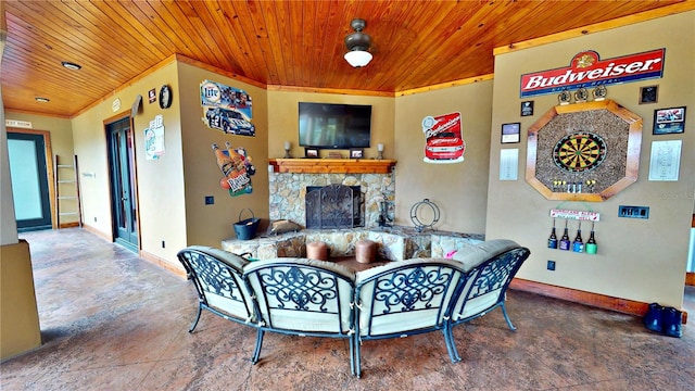 540 Phillips Rd, Sebring, FL 33875 - living room featuring wooden ceiling, ornamental molding, baseboards, and a stone fireplace