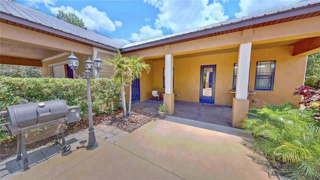 540 Phillips Rd, Sebring, FL 33875 - covered porch featuring a grill