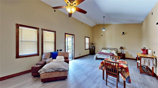 540 Phillips Rd, Sebring, FL 33875 - bedroom featuring baseboards, wood finished floors, high vaulted ceiling, and a ceiling fan