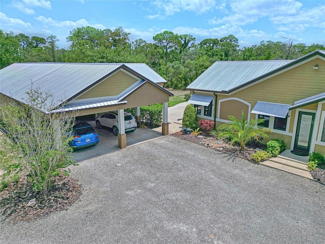 540 Phillips Rd, Sebring, FL 33875 - view of vehicle parking with driveway and a detached carport