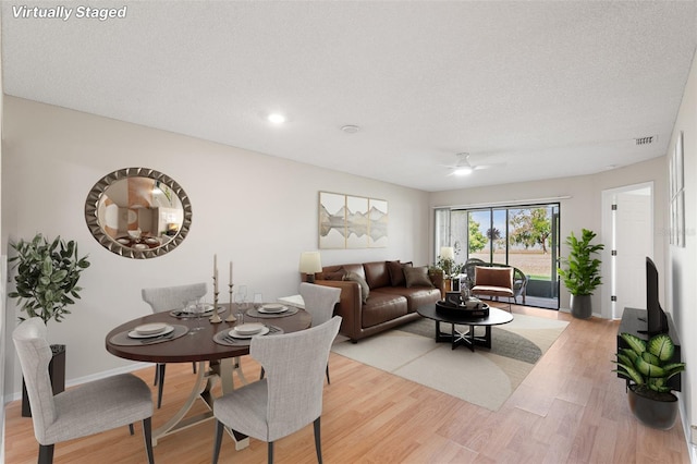 703 Magnolia Pl Unit 703, Winter Haven, FL 33884 - dining room with light wood-type flooring, a ceiling fan, recessed lighting, and baseboards