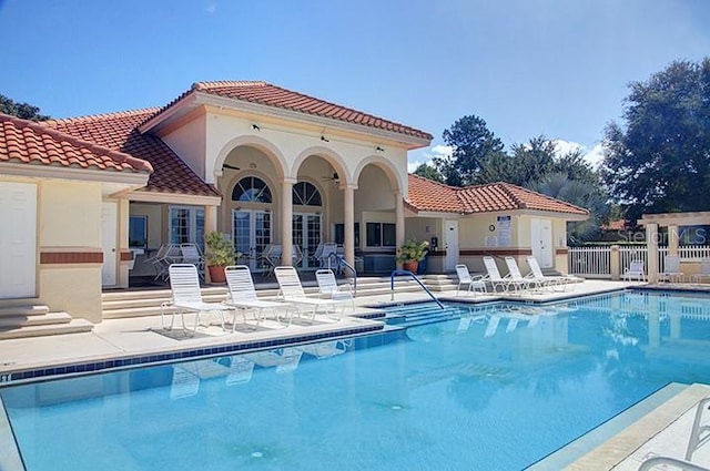 703 Magnolia Pl Unit 703, Winter Haven, FL 33884 - community pool featuring a patio area