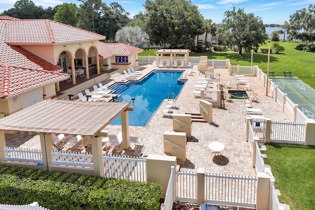 703 Magnolia Pl Unit 703, Winter Haven, FL 33884 - community pool with a pergola and a patio area
