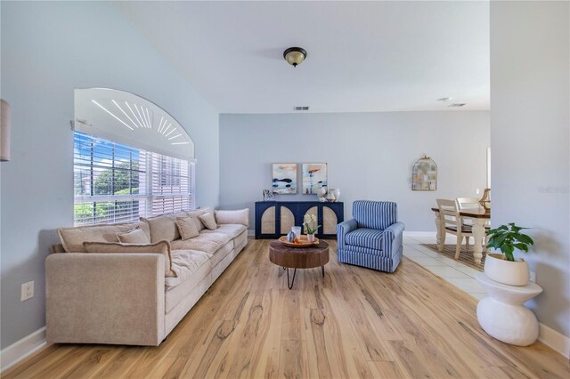 413 Ruby Lake Pl, Winter Haven, FL 33884 - living room with baseboards and wood finished floors
