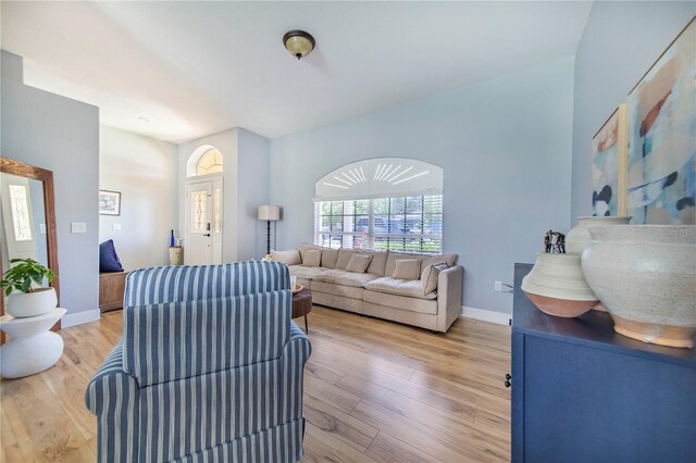 413 Ruby Lake Pl, Winter Haven, FL 33884 - living room with light wood finished floors and baseboards