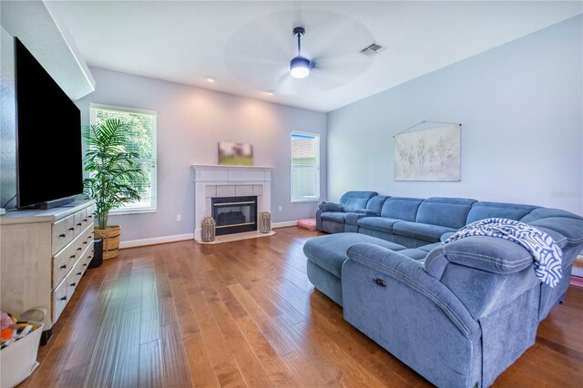 413 Ruby Lake Pl, Winter Haven, FL 33884 - living area featuring ceiling fan, healthy amount of natural light, and wood finished floors