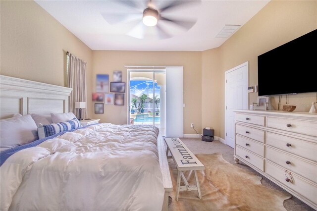 413 Ruby Lake Pl, Winter Haven, FL 33884 - bedroom featuring access to outside, light carpet, baseboards, and ceiling fan