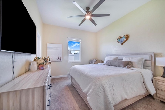 413 Ruby Lake Pl, Winter Haven, FL 33884 - bedroom with light carpet, baseboards, and a ceiling fan