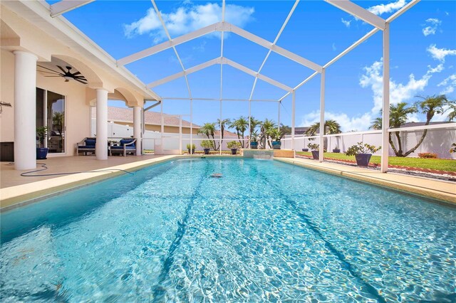 413 Ruby Lake Pl, Winter Haven, FL 33884 - view of swimming pool with a patio, ceiling fan, and a lanai