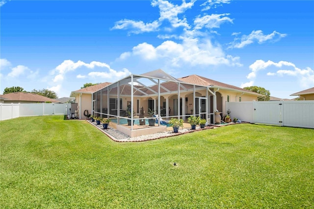 413 Ruby Lake Pl, Winter Haven, FL 33884 - back of house with a gate, stucco siding, an outdoor pool, a patio, and a lanai