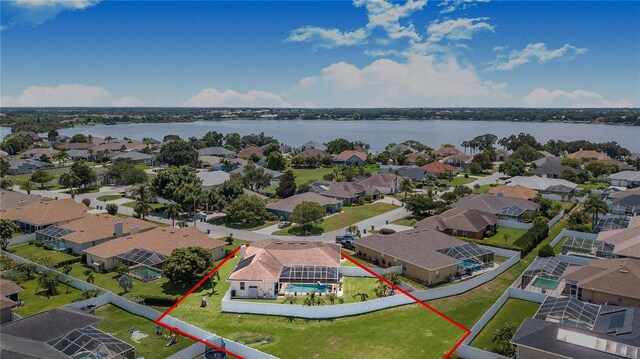 413 Ruby Lake Pl, Winter Haven, FL 33884 - aerial view of residential area with a nearby body of water and a pool area