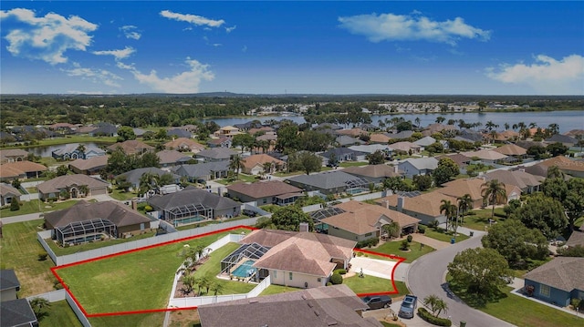 413 Ruby Lake Pl, Winter Haven, FL 33884 - aerial perspective of suburban area with a large body of water and property boundaries highlighted