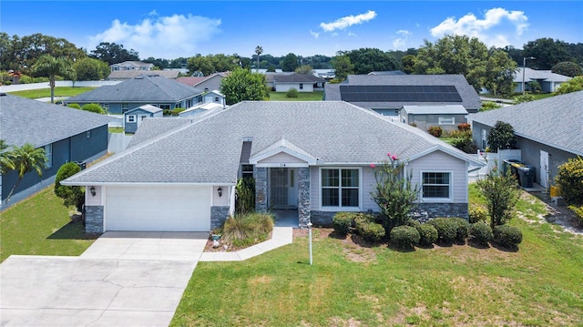 114 Belmont Dr, Winter Haven, FL 33884 - view of front of house with stone siding, an attached garage, a residential view, concrete driveway, and a front lawn