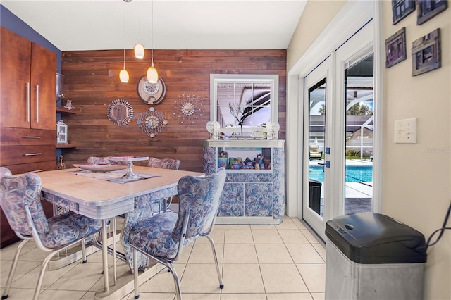 114 Belmont Dr, Winter Haven, FL 33884 - dining room featuring wooden walls and light tile patterned flooring