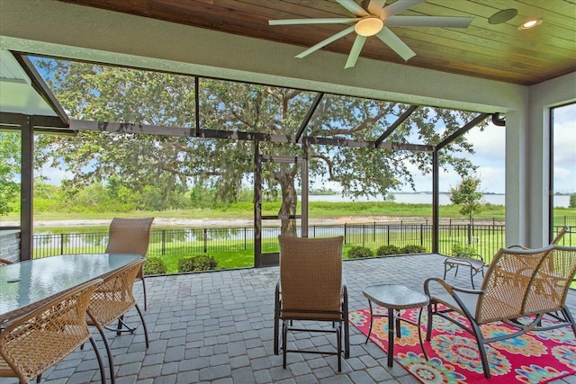 505 Adams View Ln, Auburndale, FL 33823 - sunroom featuring a water view and a ceiling fan