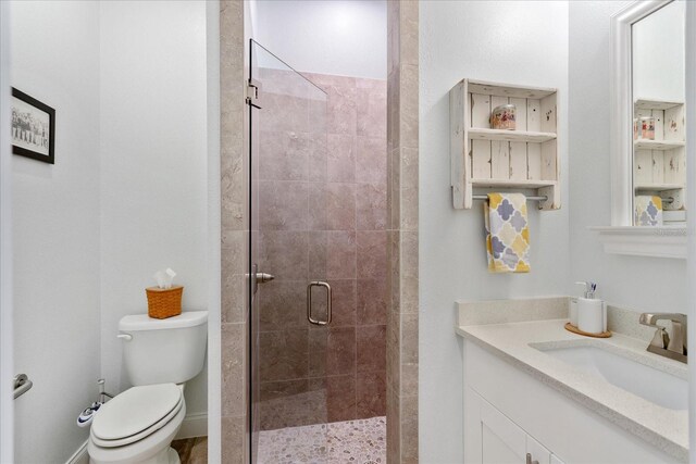 505 Adams View Ln, Auburndale, FL 33823 - bathroom featuring vanity, a shower stall, and toilet