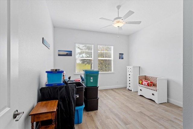 505 Adams View Ln, Auburndale, FL 33823 - home office with wood finished floors, ceiling fan, and baseboards