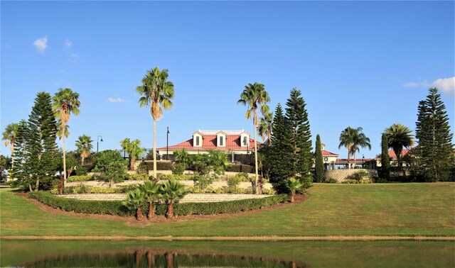 505 Adams View Ln, Auburndale, FL 33823 - view of home's community featuring a lawn and a water view