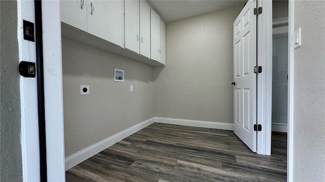 1735 Council Dr, Sun City Center, FL 33573 - laundry area featuring washer hookup, dark wood-type flooring, hookup for an electric dryer, baseboards, and cabinet space