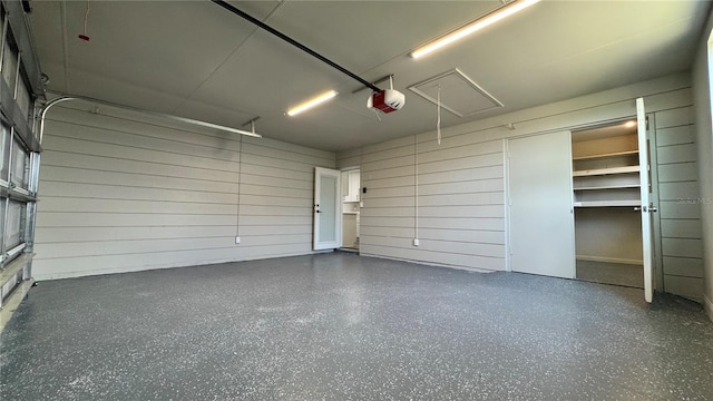 1735 Council Dr, Sun City Center, FL 33573 - garage featuring a garage door opener
