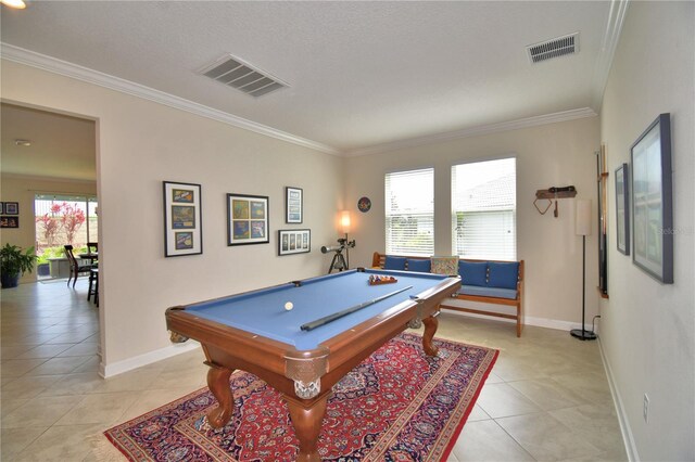 1433 Bunker Dr, Davenport, FL 33896 - recreation room with crown molding, billiards table, light tile patterned flooring, and baseboards