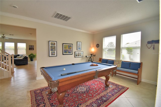1433 Bunker Dr, Davenport, FL 33896 - game room with light tile patterned floors, pool table, ornamental molding, baseboards, and a ceiling fan