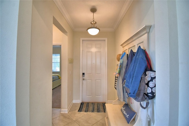 1433 Bunker Dr, Davenport, FL 33896 - mudroom featuring light tile patterned floors, crown molding, and baseboards