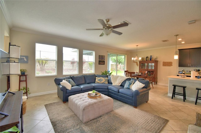 1433 Bunker Dr, Davenport, FL 33896 - living room featuring crown molding, light tile patterned floors, a ceiling fan, a chandelier, and baseboards