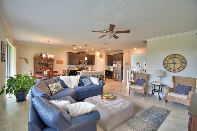 1433 Bunker Dr, Davenport, FL 33896 - living room featuring light tile patterned floors, a ceiling fan, crown molding, stairway, and a chandelier