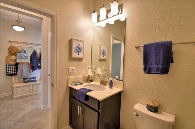 1433 Bunker Dr, Davenport, FL 33896 - bathroom with vanity, tile patterned floors, and toilet