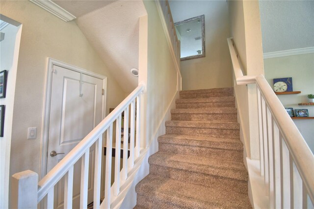 1433 Bunker Dr, Davenport, FL 33896 - stairs with vaulted ceiling and ornamental molding
