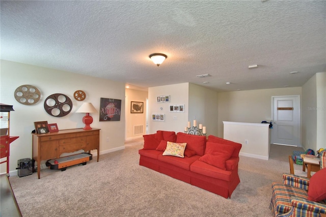 1433 Bunker Dr, Davenport, FL 33896 - carpeted living room featuring a textured ceiling and baseboards