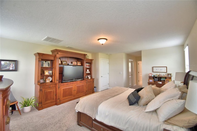 1433 Bunker Dr, Davenport, FL 33896 - carpeted bedroom with a textured ceiling