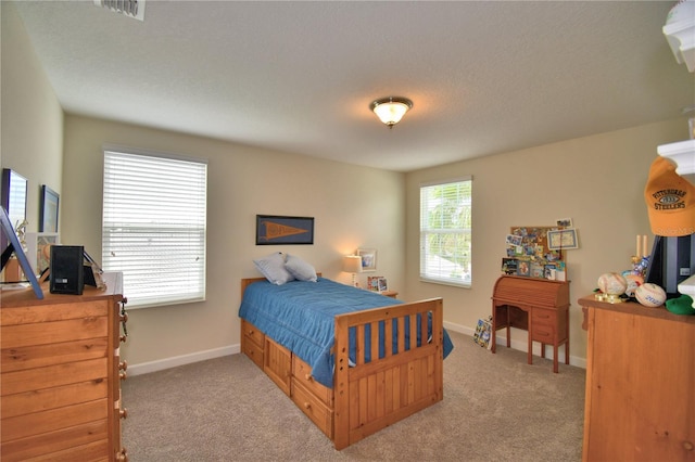 1433 Bunker Dr, Davenport, FL 33896 - carpeted bedroom featuring baseboards