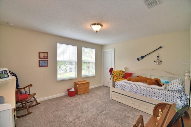 1433 Bunker Dr, Davenport, FL 33896 - carpeted bedroom featuring a textured ceiling and baseboards