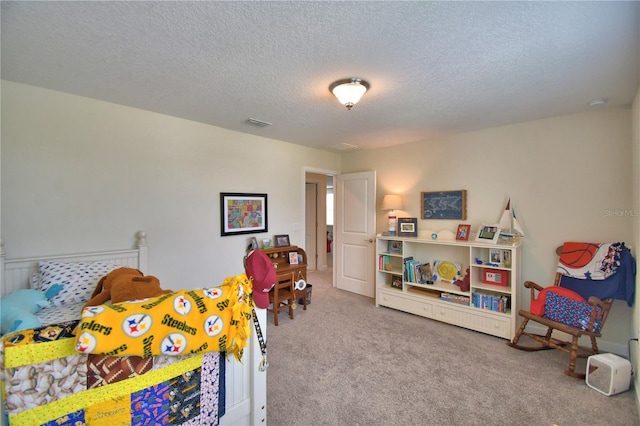 1433 Bunker Dr, Davenport, FL 33896 - bedroom with carpet flooring and a textured ceiling