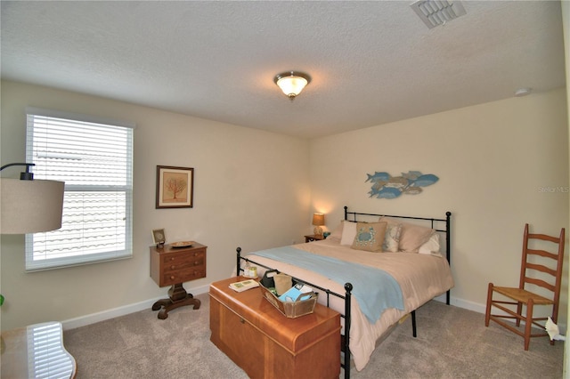 1433 Bunker Dr, Davenport, FL 33896 - bedroom with carpet flooring, a textured ceiling, and baseboards