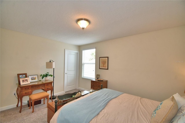 1433 Bunker Dr, Davenport, FL 33896 - bedroom with baseboards, carpet floors, and a textured ceiling