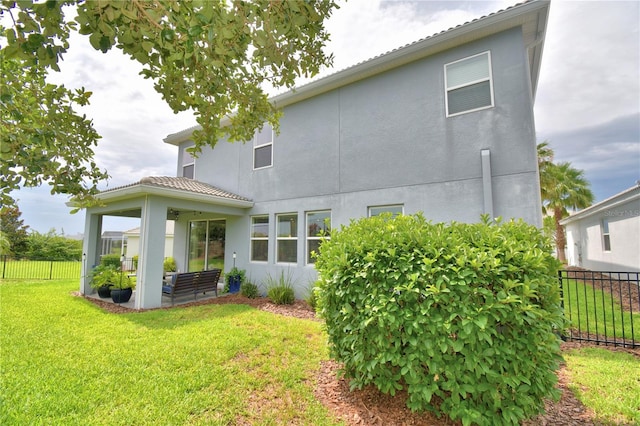 1433 Bunker Dr, Davenport, FL 33896 - back of house with stucco siding